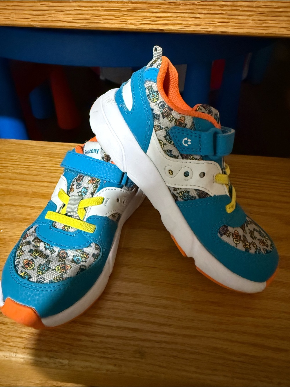 Saucony Kids Teal, White & Orange Sneakers with Yellow Accents